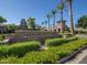 Entrance to Verrado Golf Club featuring lush landscaping, creating a welcoming atmosphere for golf enthusiasts at 20546 W Summit Pl, Buckeye, AZ 85396