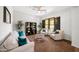 Inviting living room with neutral tones, comfortable seating, and natural light from large windows at 20546 W Summit Pl, Buckeye, AZ 85396