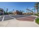 Street view showcasing a well-maintained community with tree-lined streets and inviting architecture at 20546 W Summit Pl, Buckeye, AZ 85396