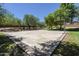 Outdoor community basketball court featuring mature trees and well-maintained landscaping at 20734 N 38Th St, Phoenix, AZ 85050