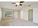 Bright bedroom with neutral carpet and large window offers a comfortable and inviting space at 20734 N 38Th St, Phoenix, AZ 85050