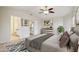 Comfortable main bedroom featuring a plush bed, ensuite bathroom, and stylish decor for a restful retreat at 20734 N 38Th St, Phoenix, AZ 85050