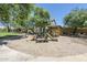 Community playground with slides, climbing structures, and a shaded picnic area at 20734 N 38Th St, Phoenix, AZ 85050