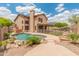 Inviting backyard showcasing a swimming pool, hot tub, grassy area, and covered patio, perfect for outdoor entertaining at 20809 N 1St Ave, Phoenix, AZ 85027
