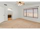 Large carpeted main bedroom with vaulted ceiling and ensuite bath at 20809 N 1St Ave, Phoenix, AZ 85027
