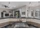 Modern stainless sink and granite counters offers a clean functional space, complemented by decorative pendant lights at 22166 N Lakeside Dr, Maricopa, AZ 85138