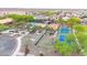 An aerial shot showcases a community pool and amenities with tennis courts for activities and leisure at 22282 N 184Th Ln, Surprise, AZ 85387