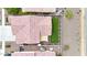Aerial shot of a house with a well-maintained backyard, privacy fences, and desert landscape at 22282 N 184Th Ln, Surprise, AZ 85387