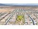 Overhead shot of a neighborhood featuring single-Gathering homes, green spaces, and desert surroundings at 22282 N 184Th Ln, Surprise, AZ 85387