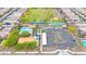 Overhead view of community amenities featuring a pool, tennis courts, basketball court and ample parking at 22282 N 184Th Ln, Surprise, AZ 85387