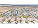 Scenic aerial view showcasing homes with desert landscaping and mountain views at 22282 N 184Th Ln, Surprise, AZ 85387