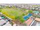 Overhead view of a well-maintained community park offering a playground and open space for recreation at 22282 N 184Th Ln, Surprise, AZ 85387
