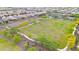 Overhead view of a well-manicured community field with a soccer goal and walking paths, ideal for recreation at 22282 N 184Th Ln, Surprise, AZ 85387