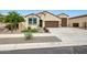 Inviting home exterior with well-manicured lawn and charming curb appeal at 22282 N 184Th Ln, Surprise, AZ 85387