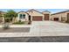 Charming single-Gathering home with a well-kept lawn and low-maintenance landscaping at 22282 N 184Th Ln, Surprise, AZ 85387