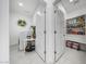 Functional laundry room and pantry featuring a washer-dryer and plenty of storage shelving at 22282 N 184Th Ln, Surprise, AZ 85387