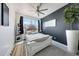 Beautiful bedroom with a decorative wall, a ceiling fan, and lots of natural light at 22282 N 184Th Ln, Surprise, AZ 85387