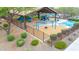 Community playground with slides, swings, and a splash pad provides hours of fun and entertainment at 22282 N 184Th Ln, Surprise, AZ 85387