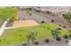 Aerial view of community playground with swings and open field, perfect for Gathering fun and outdoor activities at 22282 N 184Th Ln, Surprise, AZ 85387