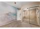 Bedroom featuring a beach themed wall and mirrored closet doors at 22683 N Aaron Rd, Maricopa, AZ 85138