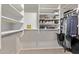 Organized closet featuring shelving and hanging storage space at 22683 N Aaron Rd, Maricopa, AZ 85138