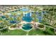 Stunning aerial view of the community pool, golf course, and picturesque landscaping at 22683 N Aaron Rd, Maricopa, AZ 85138