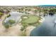Picturesque golf course by the community lake, offering residents a scenic and recreational amenity at 22683 N Aaron Rd, Maricopa, AZ 85138