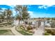 Charming park pavilion with picnic tables by the community lake, ideal for outdoor relaxation at 22683 N Aaron Rd, Maricopa, AZ 85138