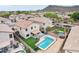 Aerial view of properties featuring pools, patios, and mountain views at 2306 E Parkside Ln, Phoenix, AZ 85024