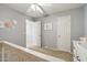 Upper level of a home featuring a bedroom with neutral colors and a small hallway at 2306 E Parkside Ln, Phoenix, AZ 85024