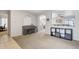 Bright and airy living room with carpeted floor, piano, and open layout to other rooms at 2306 E Parkside Ln, Phoenix, AZ 85024