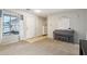 Welcoming living room with tiled entry, carpet, piano, and soft natural light at 2306 E Parkside Ln, Phoenix, AZ 85024