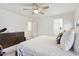 Relaxing main bedroom with a large dresser and closet access from both sides of the bed at 2306 E Parkside Ln, Phoenix, AZ 85024