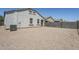 Backyard showing low maintenance landscaping, stucco exterior, and privacy wall at 2625 W Gaby Rd, Phoenix, AZ 85041