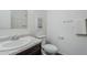 Bathroom with granite-style counters, toilet and decorative mirror add style at 2625 W Gaby Rd, Phoenix, AZ 85041