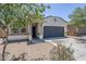 Charming single-story home featuring a two-car garage and neutral stucco facade at 2625 W Gaby Rd, Phoenix, AZ 85041