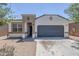 Charming single-story home featuring a two-car garage and neutral stucco facade at 2625 W Gaby Rd, Phoenix, AZ 85041