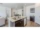 Well-equipped kitchen with stainless steel sink and view of the dining area at 2625 W Gaby Rd, Phoenix, AZ 85041