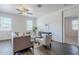 Comfortable living room with modern ceiling fan and neutral decor at 2625 W Gaby Rd, Phoenix, AZ 85041