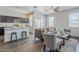 Open-concept living room boasts lots of natural light and modern furnishings at 2625 W Gaby Rd, Phoenix, AZ 85041
