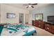 The bedroom has carpet, a ceiling fan, and an ensuite bathroom at 2662 S Springwood Blvd # 462, Mesa, AZ 85209