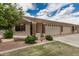 Attractive single-story home featuring stone veneer accents on the facade and a well-kept lawn at 2662 S Springwood Blvd # 462, Mesa, AZ 85209
