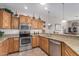 Functional kitchen with stainless steel appliances, granite countertops, and ample cabinet space for storage at 2662 S Springwood Blvd # 462, Mesa, AZ 85209