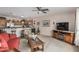Open living room with a view into the kitchen, comfortable seating, and a decorative touch at 2662 S Springwood Blvd # 462, Mesa, AZ 85209