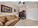 The carpeted office features a ceiling fan, sofa, and a built-in desk at 2662 S Springwood Blvd # 462, Mesa, AZ 85209