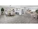 Open-concept living and dining area with modern decor and hardwood floors at 3046 E Glenrosa Ave, Phoenix, AZ 85016