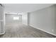 Spacious living room features modern flooring, neutral paint and great natural light at 3046 E Glenrosa Ave, Phoenix, AZ 85016