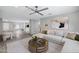 Spacious living area with view of the kitchen and bright, natural light at 3046 E Glenrosa Ave, Phoenix, AZ 85016
