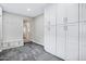 Well-organized mud room with built-in bench and ample storage cabinets, perfect for keeping things tidy at 3046 E Glenrosa Ave, Phoenix, AZ 85016