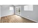 Light-filled room with hardwood floors, French doors and multiple windows at 3046 E Glenrosa Ave, Phoenix, AZ 85016
